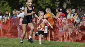 Large crowds dash for pumpkins in Sterling’s Hoover Park