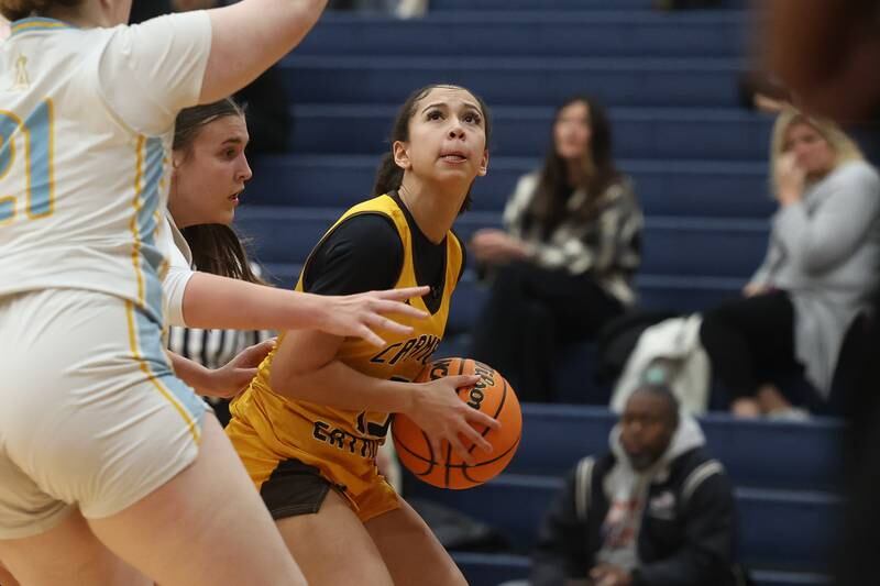 Carmel’s Maliyah Mays looks to take a shot against Joliet Catholic on Wednesday, Jan 15, 2025 in Joliet.