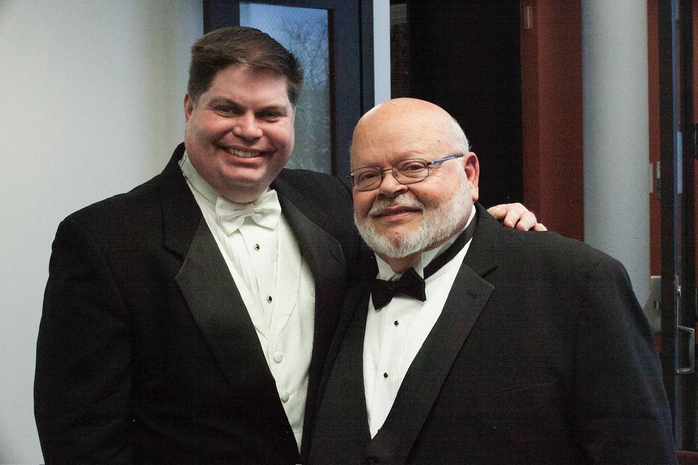 Charles Morgan, music professor and director of bands at JJC (left), said Jerry Lewis (right) was the reason he decided to pursue a music career instead of one in engineering. Lewis, who retired as chairman of Fine Arts at Joliet Junior College in 2003, left an indelible mark on Joliet's music legacy and inspired many of his students to pursue careers in music.