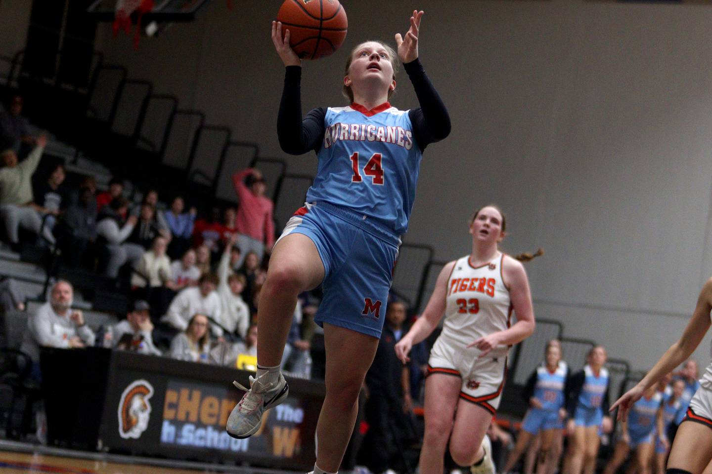 Marian Central’s Abbey Miner makes a layup in Northern Illinois Holiday Classic championship girls basketball game action at  McHenry High School Thursday.