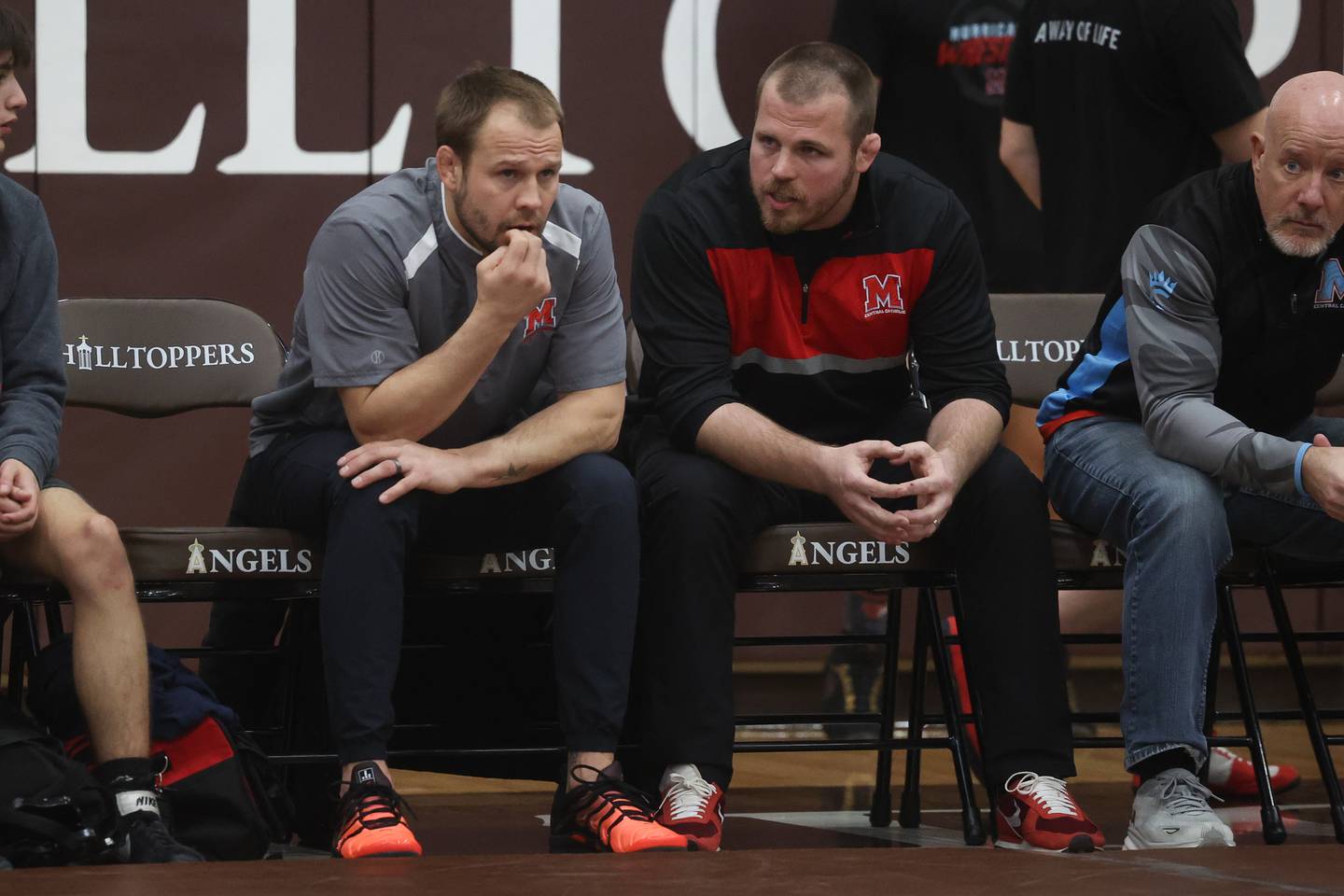 Marian Central co-coaches Ryan Prater (left) and Jordan Blanton talk during a match against Mt. Carmel in the tri-meet at Joliet Catholic on Thursday, Jan. 18th, 2024 in Joliet.