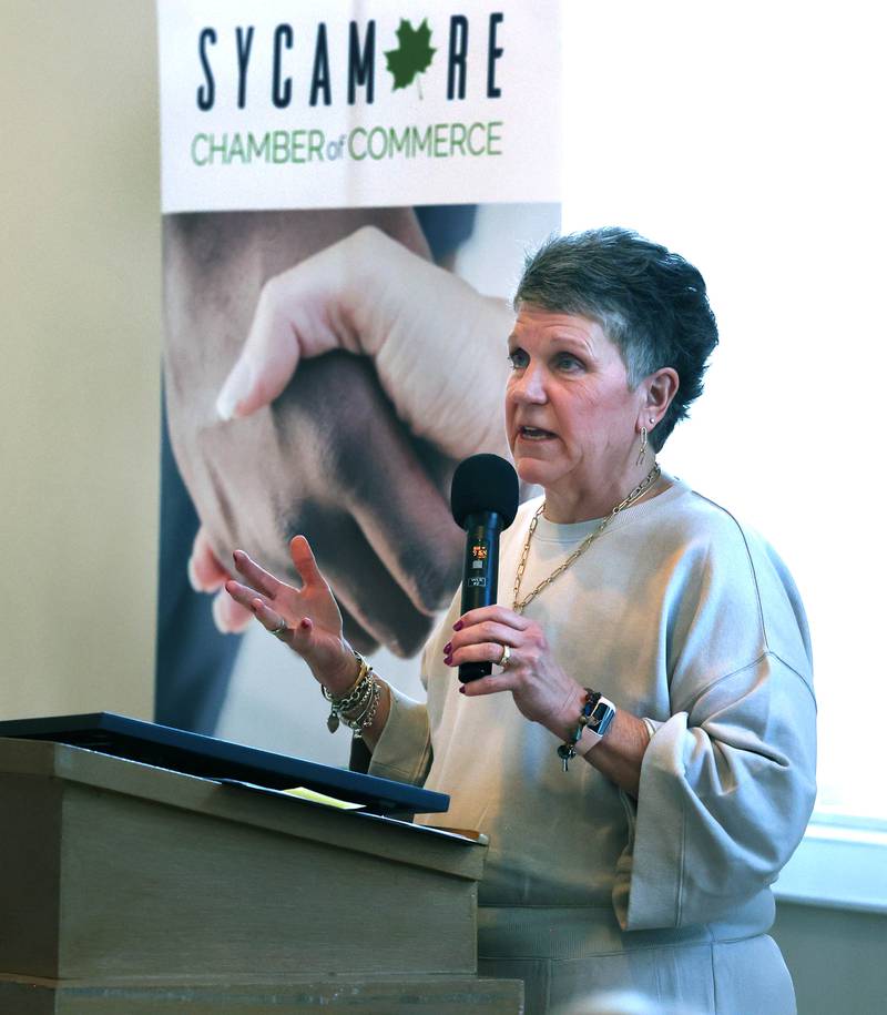 Michelle Schulz, who owned and operated Kar-Fre Flowers along with her sister Kris Wrenn (not pictured), speaks after she and her sister were introduced as the winners of the Clifford Danielson Outstanding Citizen Award during the Sycamore Chamber of Commerce Annual Meeting Thursday, March 6, 2025, at St. Mary's Catholic Church in Sycamore.