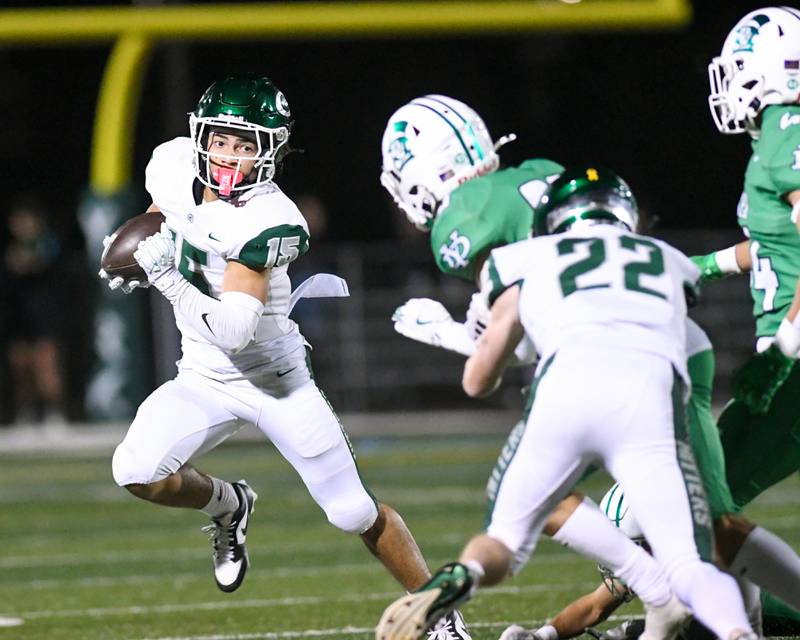 York's Dean McParlin (15) tries to get around Glenbard West defenders during the game on Friday Oct. 17, 2025, held at York High School.