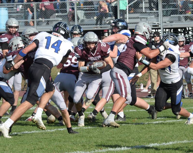 Rockridge's Jacob Freyermuth (28) runs for yards against Eastland-Pearl City in the 2A state football playoff's first round on Saturday, Nov. 2, 2024 at Eddington.