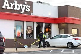 Photos: Car strikes Arbys in Peru