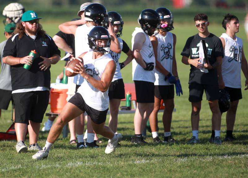 Woodstock North quarterback Parker Halihan prepares to throw the ball during a 7 on 7 football tournament on Tuesday, July 15, 2025 at Kaneland High School in Maple Park.