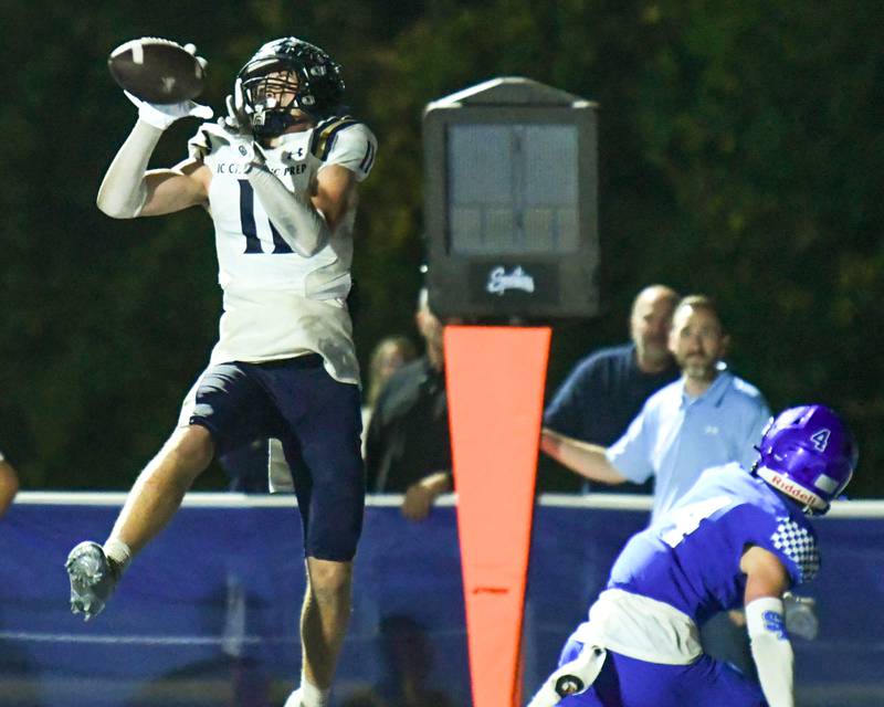 IC Catholic Prep's Grant Bowen (11) catches the ball in the endzone on Friday Oct. 3, 2025, while traveling to take on St. Francis High School.