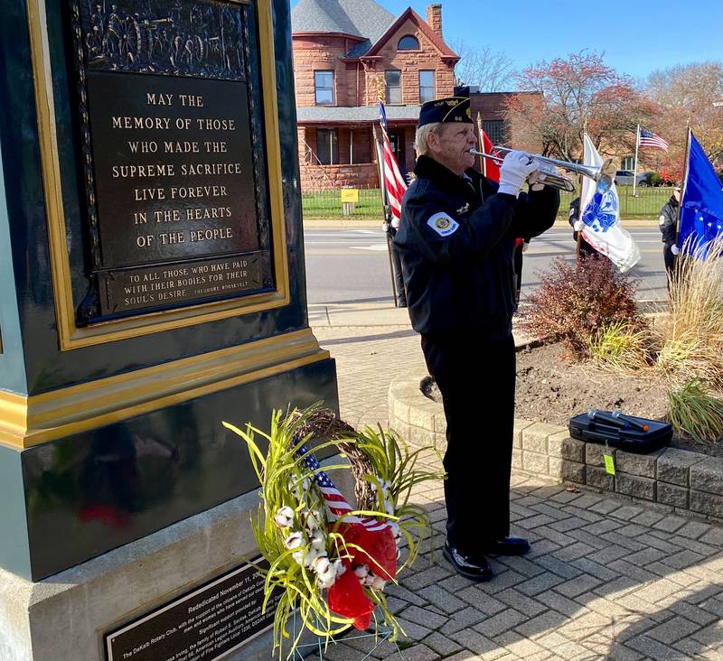 Michael Embrey, U.S. Air Force veteran from DeKalb, performs "Taps" during an annual Veterans Day ceremony Saturday, Nov. 11, 2023 in downtown DeKalb. The event was hosted by the DeKalb American Legion Post No. 66.