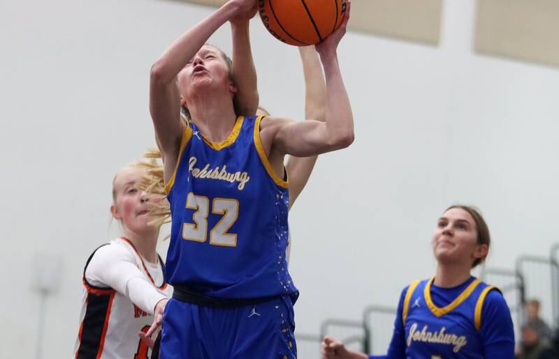 Johnsburg’s Skye Toussaint works under the hoop in varsity girls basketball on Saturday, Jan. 4, 2025, at McHenry High School in McHenry.
