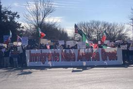 Several hundred Bolingbrook High School students march through streets protesting ICE