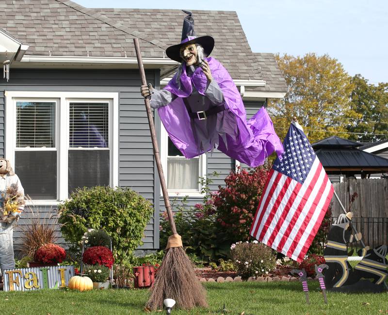 This witch looks like she's flying through the air in the 300 block of West Walnut Street on Wednesday, Oct. 18, 2023 in Oglesby.