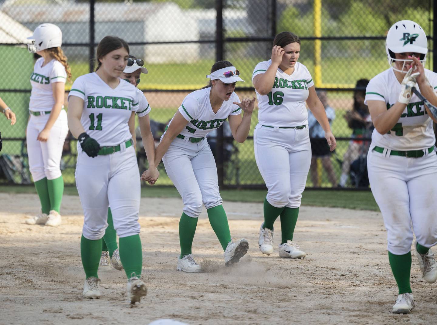 The Rock Falls Rockets softball team celebrates a 17-2 win over Byron in the regional semifinal Tuesday, May 16, 2023.