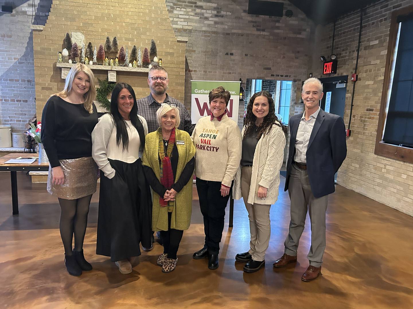 Women Inspired Network's 2025 Celebration of Giving Sunday grant recipients Grow Spring Valley member Katie Ritchie (from left), Grow Spring Valley member Sarah Kinkin, Peru Police Department office Brian Zebron, Women Inspired Network grants chair Debbie Buffington, Waltham Elementary School teacher Kathleen Diluciano, Regional Office of Education 35 school crisis response team crisis coordinator Lindsey Ceja, and Starved Rock County Community Foundation CEO Fran Brolley