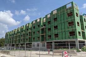 Construction of 2nd building at Oswego luxury apartments making quick progress