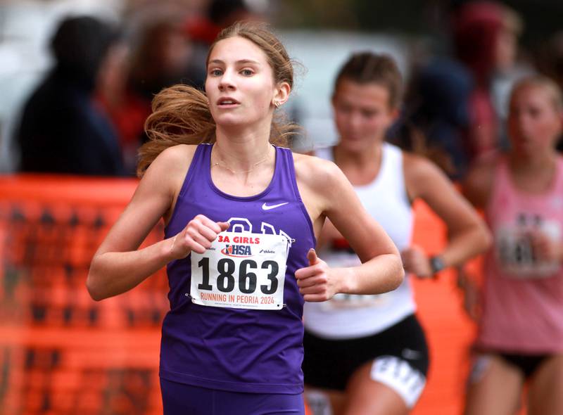 Downers Grove North's Ava Gilley competes in the Class 3A State Cross Country Championships on Saturday, Nov. 9, 2024 at Detweiller Park in Peoria.