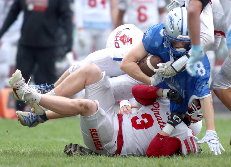 Woodstock’s JD Canty comes in for a landing after running the ball against Ottawa in varsity football at Larry Dale Field on the campus of Woodstock High School Saturday.