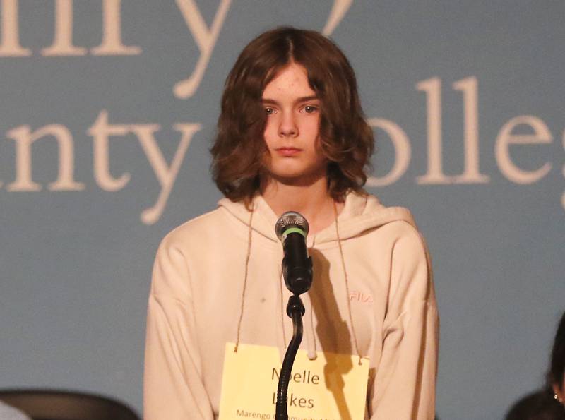 Noelle Lukes of Marengo Community Middle School competes in the McHenry County Regional Office of Education's 2023 spelling bee Wednesday, March 22, 2023, at McHenry County College's Luecht Auditorium in Crystal Lake.