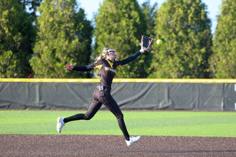 Herscher's Lexi Crawford reaches for a catch during the Tigers' 14-10 loss to Coal City on Monday, April 20, 2026.