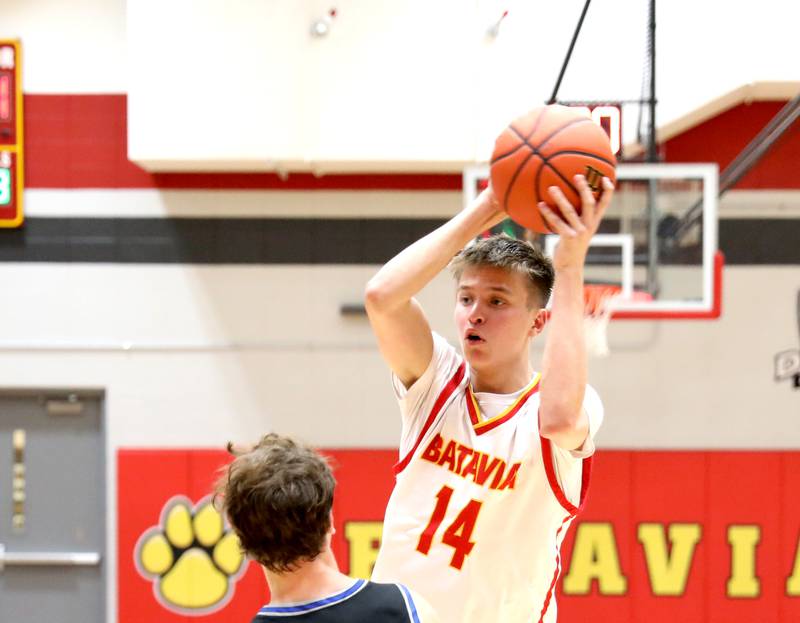 Batavia’s Jack Ambrose looks to pass the ball during a game against St. Charles North at Batavia on Wednesday, Jan. 11, 2023.