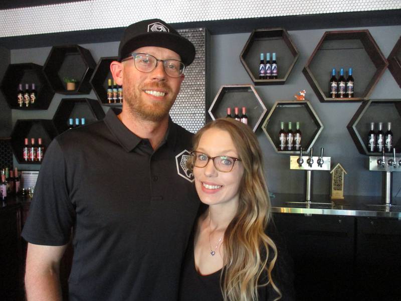 Rico and Jenna Bianchi of Yorkville have opened Foxes Den Meadery in the city's downtown. They are seen here behind the bar of their new business on May 27, 2023.