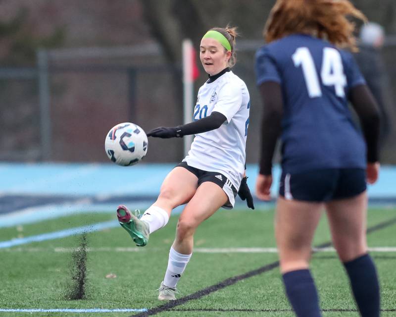 Riverside-Brookfield's Abigail Ford (20) kicks the ball down the pitch during soccer match between Riverside-Brookfield at Downers Grove South.  April 10, 2025.