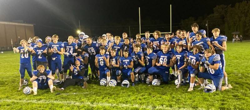 The Princeton Tigers celebrate their 54-0 win over rival Hall Friay night to cap their sixth straight Three Rivers East division championship.