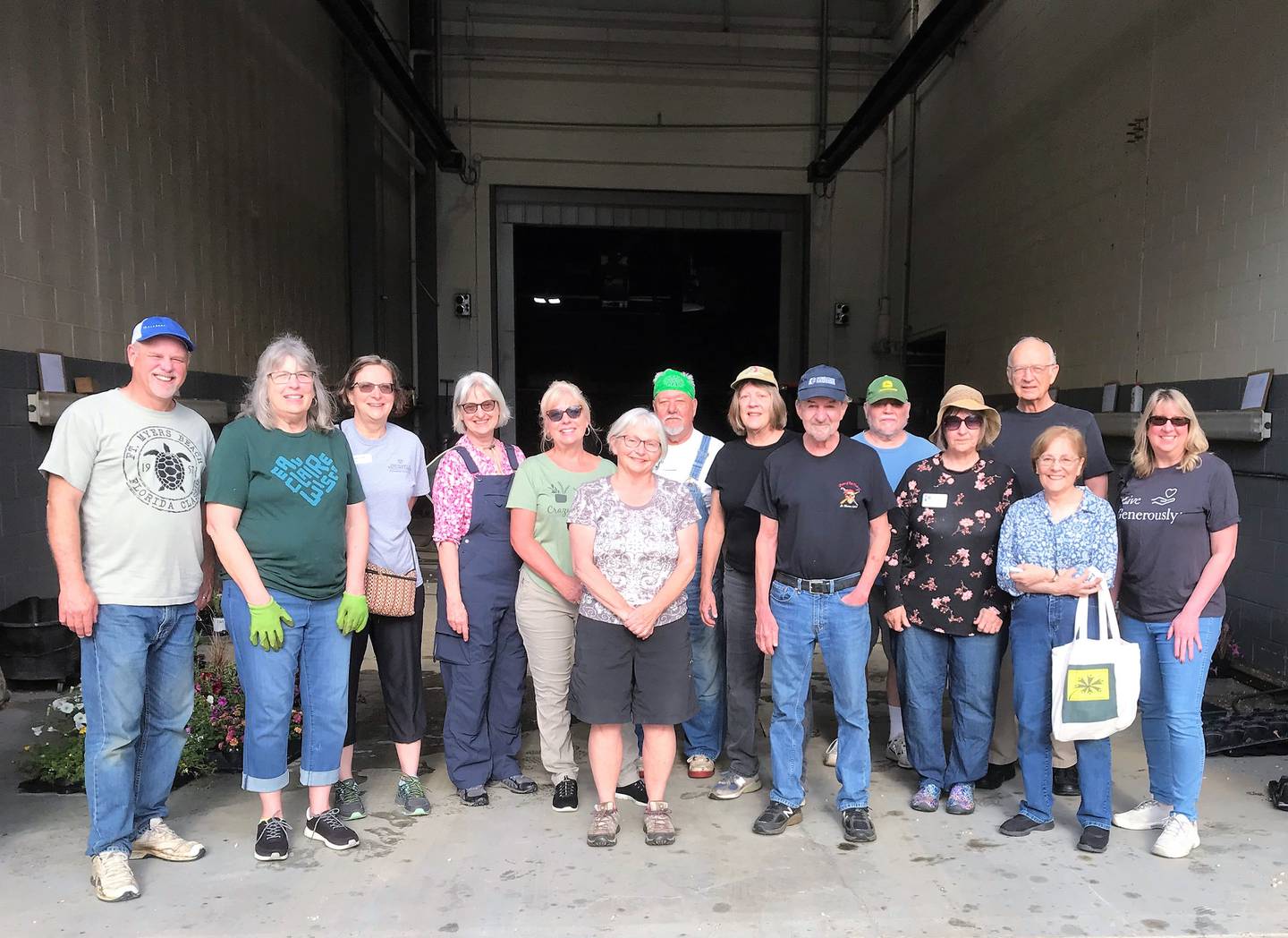 Pictured: University of Illinois Cooperative Extension’s Master Gardeners planting around 50 plant containers throughout downtown DeKalb on Saturday, May 14.