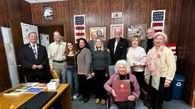 Rep. Tom Weber congratulates Richmond senior