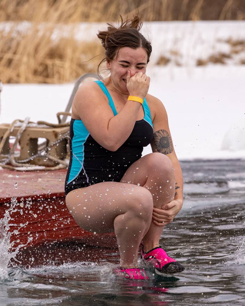 Shaley Wade leaps into the water at the Make-A-Wish Illinois Penguin Plunge on  January 31, 2026 at Skydive Chicago.