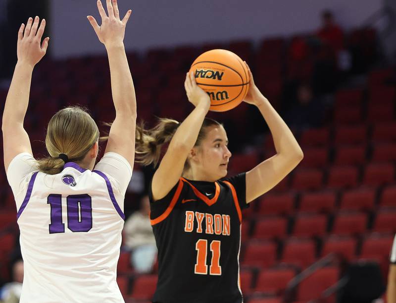 Byron's Alayna Brandt looks to pass the ball around Breese Centra's Alyssa Moore during the Class 2A title game on Saturday, March 7, 2026 at CEFCU Arena in Normal.