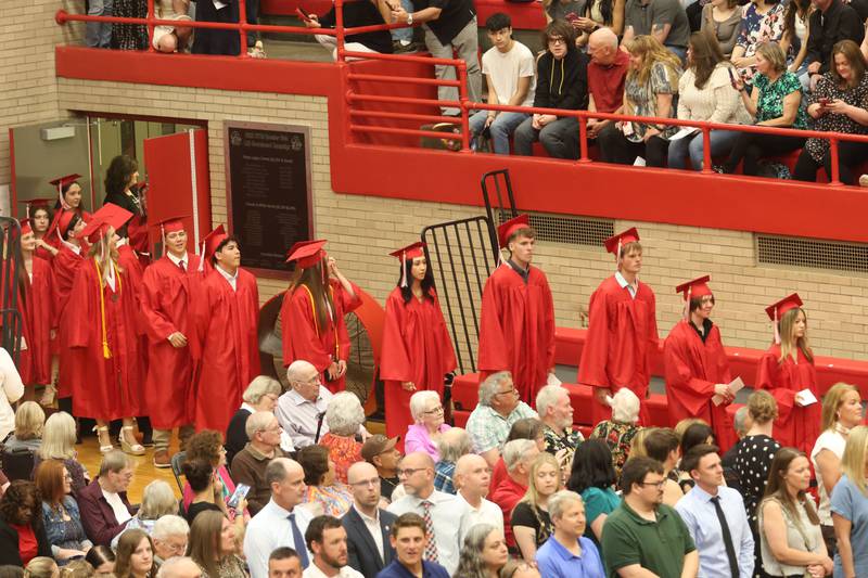 Ottawa High School class of 2026 graduates walk in procession during the commencement ceremony in Kingman Gymnasium on Friday, May 22, 2026 at Ottawa High School