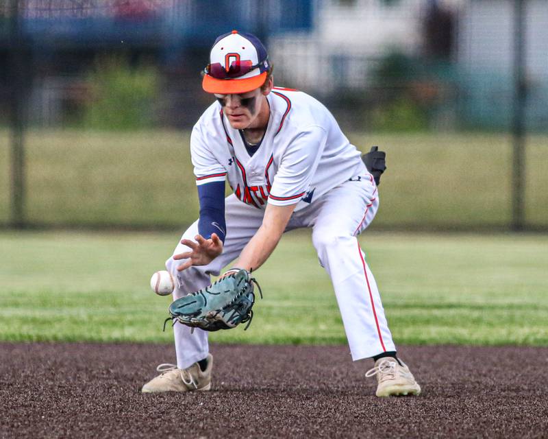 Oswego's Chase Gerwig (2) fields a grounder during Class 4A Romeoville Sectional semifinal game between Plainfield North at Oswego.  June 1, 2023
