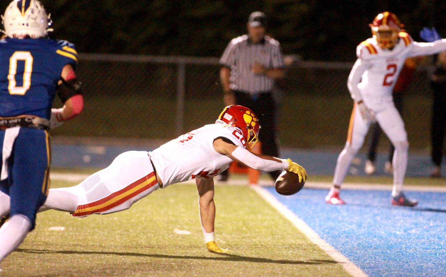 Batavia’s Nathan Whitwell stretches into the endzone for a touchdown during a game on Friday, Sept. 27, 2024 at Wheaton North.