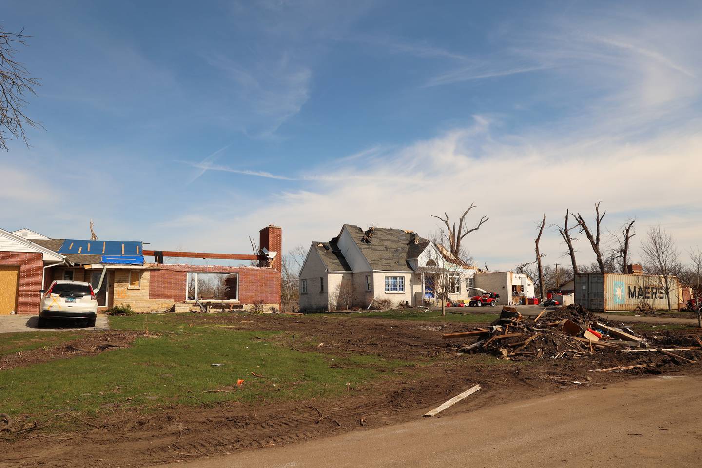 Homes in the Oakwoods subdivision in Aroma Township are shown on April 8, 2026, nearly one month after the EF-3 tornado.