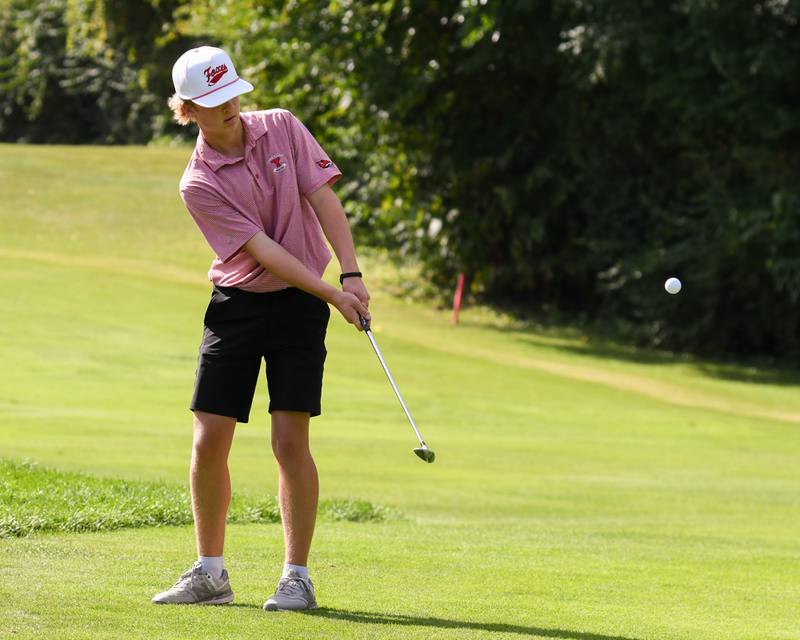 Carter Humbers of Yorkville watches his chip shot onto the green during the Plainfield Central regional on Wednesday Oct. 1, 2025, held at Wedgewood Golf Course in Plainfield.