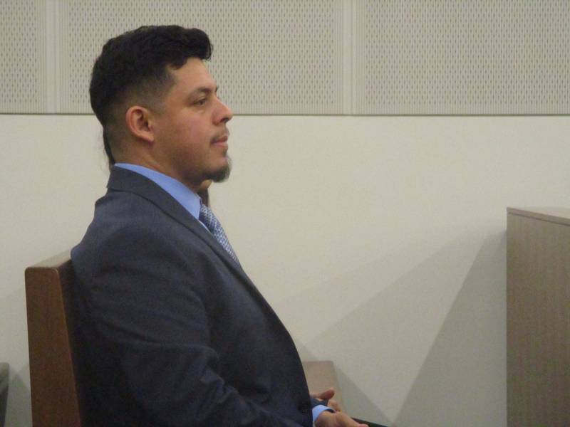 Joliet Councilman Juan Moreno listens Monday at a hearing in a case that will determine whether he remains on the City Council. Sept. 22, 2025