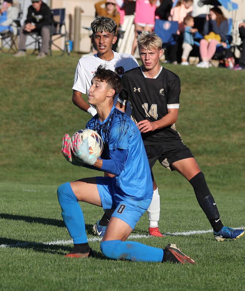 Ryan Guzinski makes a save on a DeKalb shot during the El Classicorn rivalry game Tuesday, Oct. 7, 2025, at Sycamore High School.