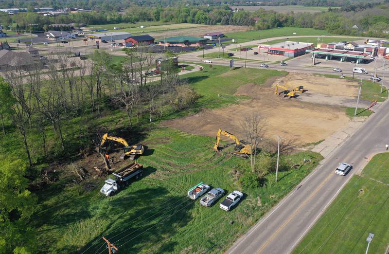 Crews excavate a lot for a future Aldi store on the corner of North Main Street and Backbone Road on Tuesday, May 6, 2025. Aldi broke ground last week. The timeline is to have the store open by Thanksgiving this year.