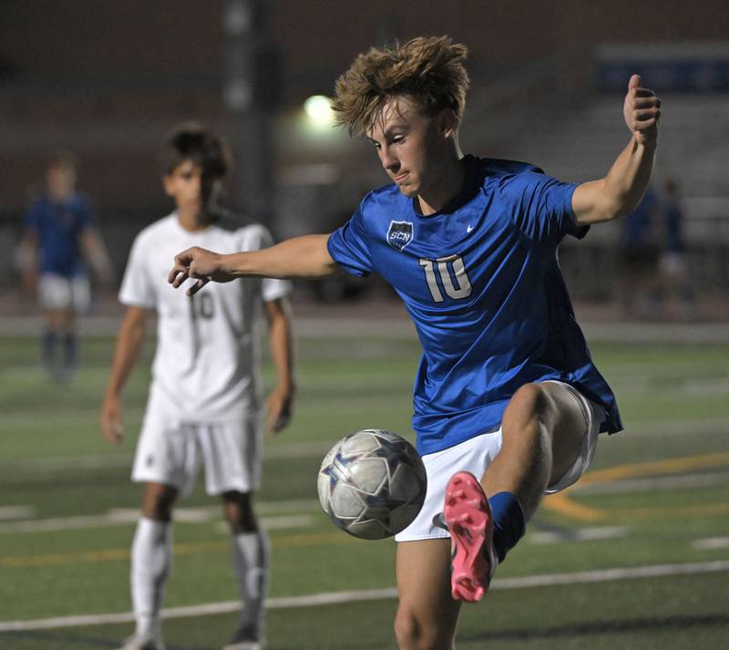 St. Charles North’s Oliver Longosz steps in front of a West Chicago pass in a boys soccer game in St. Charles on Wednesday, Sept. 4, 2024.