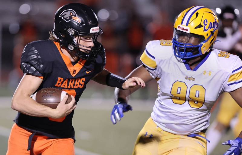 DeKalb's Michael Hodge returns a kickoff during their game against Sandburg Friday, Sept. 8, 2023, at DeKalb High School.