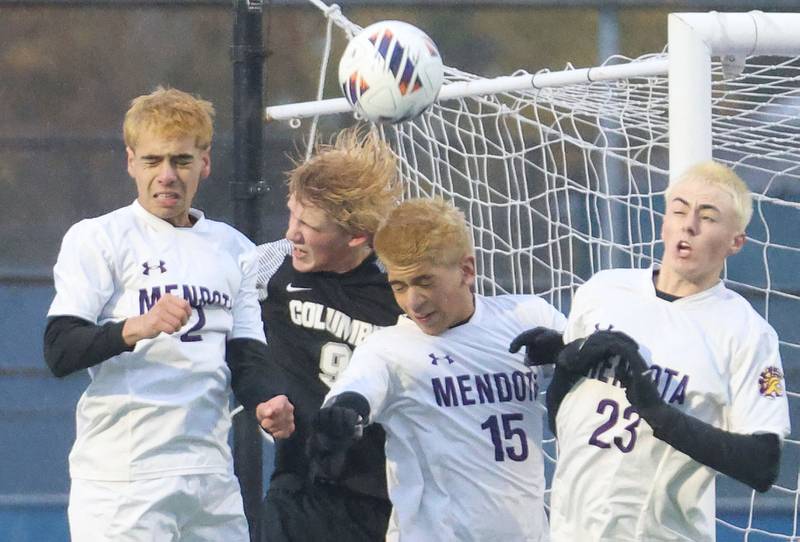 Mendota players Angel Orozco, Luis Ramirez and Alex Beetz block the ball from Columbia's Owen Worcester during the Class 1A State title game on Saturday, Nov. 8, 2025 at Hoffman Estates High School.