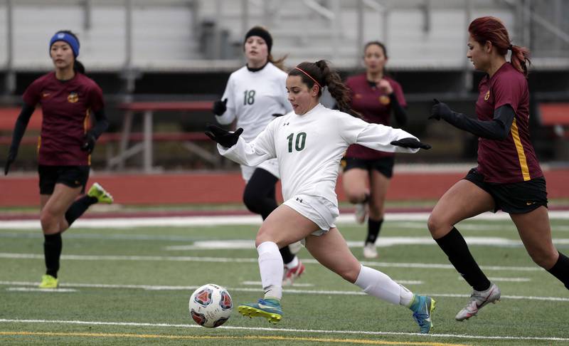 Crystal Lake South's Bella Farrington moves toward Schaumburg's goal during girls soccer action Saturday, March 26, 2022 in Schaumburg.