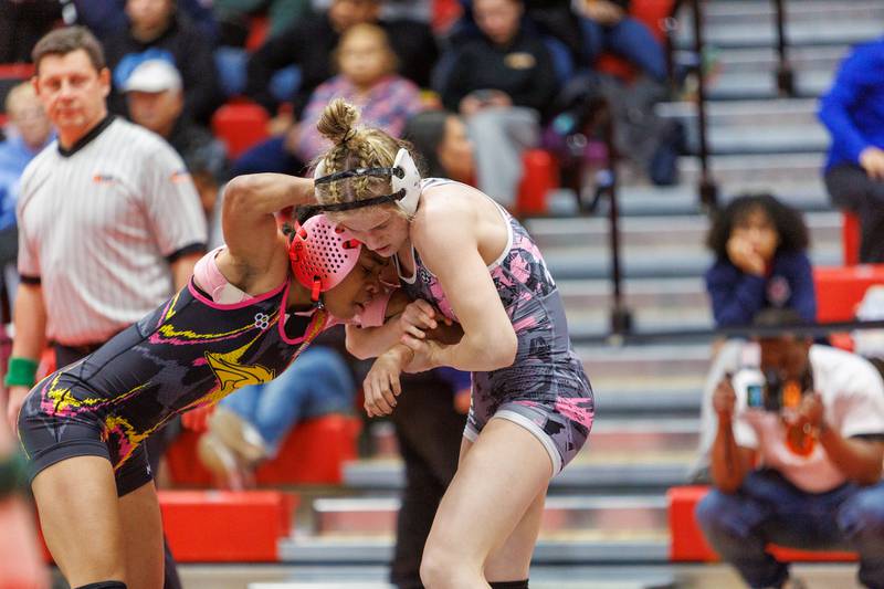Lincoln Way South's Zoe Dempsey and Metea Valley's Janiya More compete in the championship 115 lb class at the East Aurora Wrestling Regional on Saturday, Feb.7,2026 in Aurora.