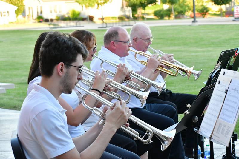 Spring Valley Municipal Band members (left right) Genaro Piccolo, Laurie Smudzinski, Gary Wood and Jim Jones perform during a 2022 concert.