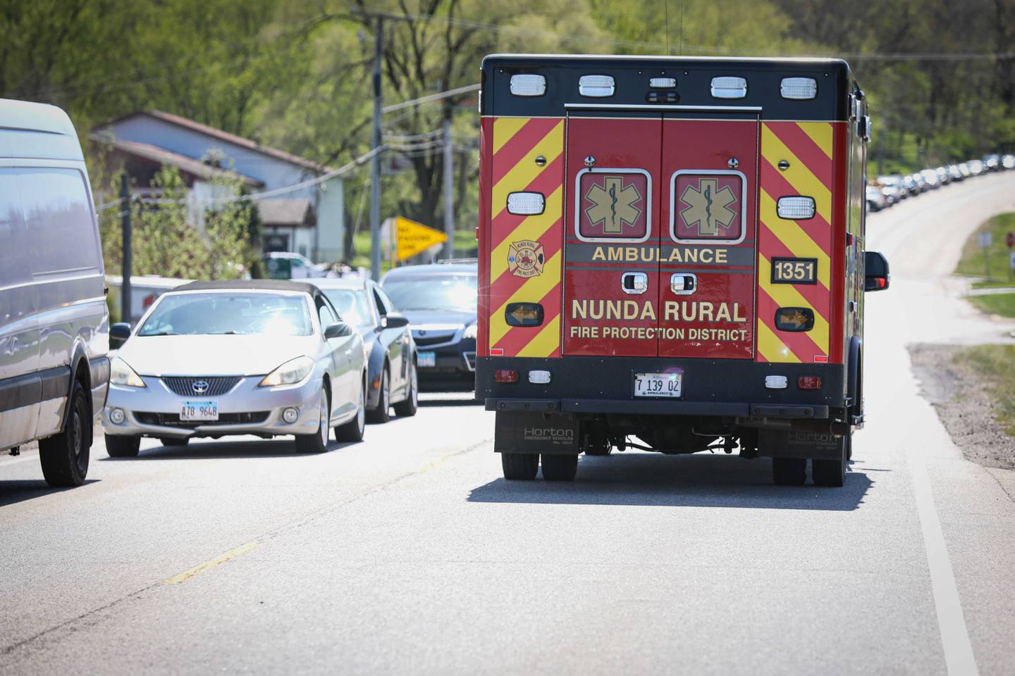Traffic on Route 176 at Prairie Grove backed up on Thursday, May 8, 2025, following a two-vehicle crash at the entrance to Prairie Isle Golf Course. Minor injuries were reported.