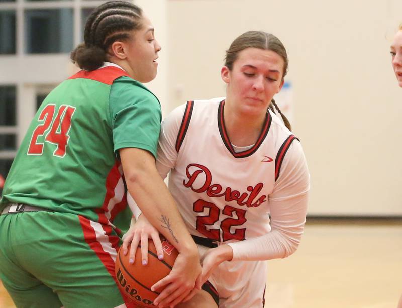 L-P's Jasmine Garman forces a jump ball on Hall's Kennedy Wozniak on Monday, Dec. 11, 2023 at Hall High School.