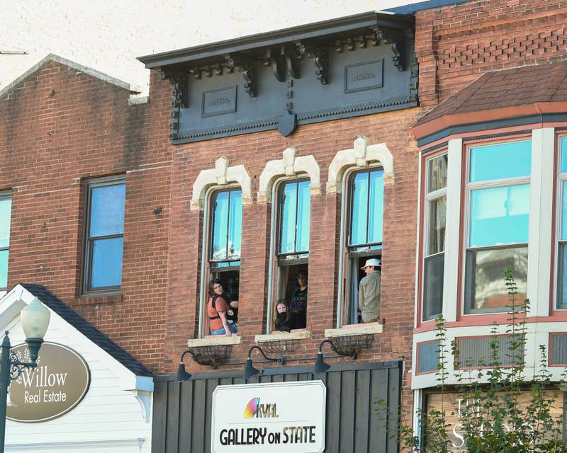 Pumpkin Parade spectators enjoy an elevated view of the parade on Sunday, Oct. 27, 2024, held in downtown Sycamore. Sunday marks the final day of the 63rd annual Sycamore Pumpkin Festival.