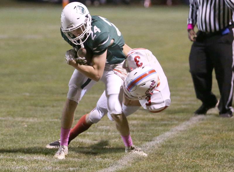 St. Bede's Phillip Gray is hit out of bounce by Ottawa's George Shumway on Friday, Oct. 25, 2024 at St. Bede Academy.