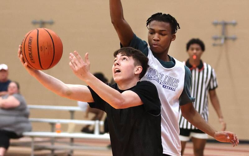 Sycamore's Jaxon Tierney goes to the basket during their game with Rockford Christian Tuesday, June 6, 2022, in a summer tournament at DeKalb High School.