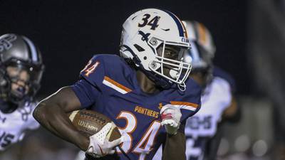 ‘I had to ball out for her’: Oswego RB shines as mom sees him play high school football for first time